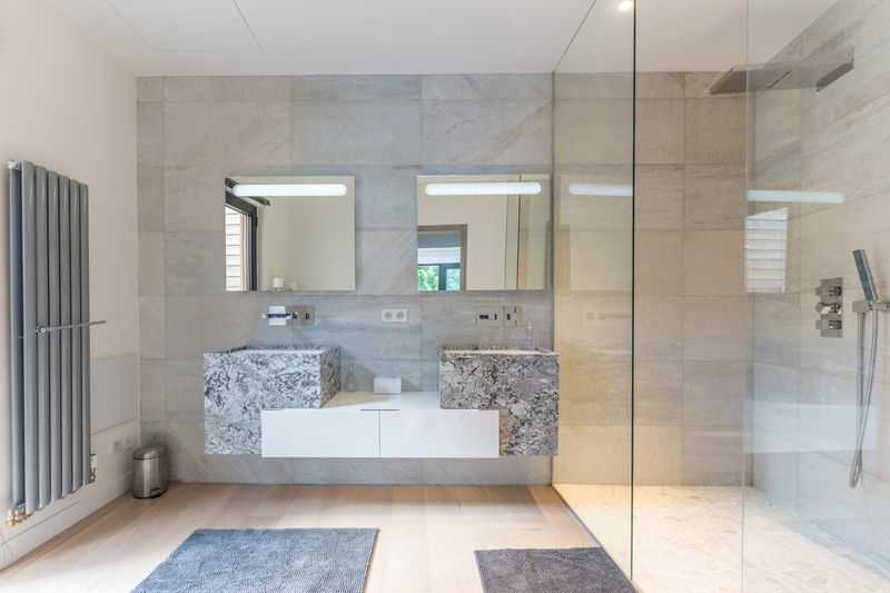 lavabos et douche - - maison ossature bois par Groupe Futura - France