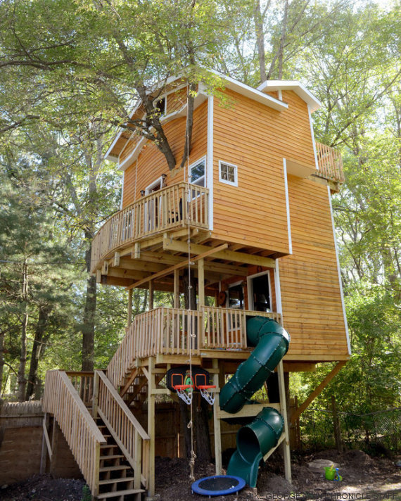 RICK FOSTER STORY; VIDEO Jay Hewitt of Attleboro is putting the finishing touches on an elaborate tree house he built for his grandchildren in a tree in his backyard.